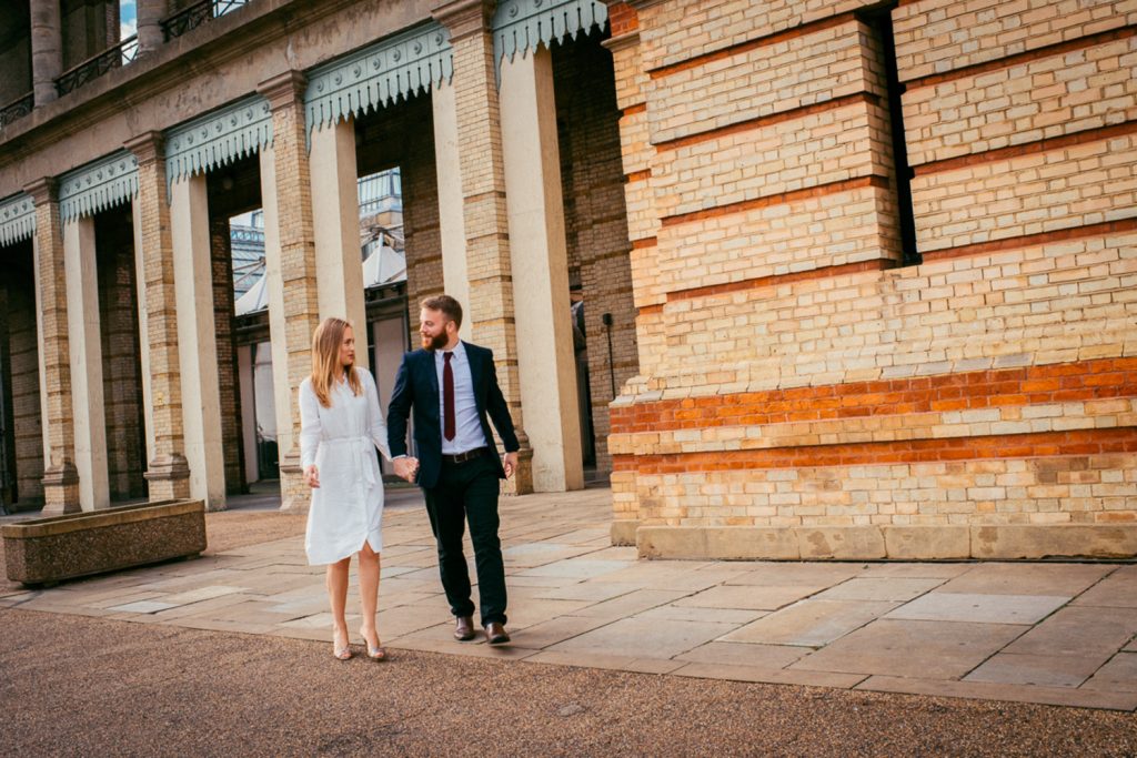 Couple walking in front of Alexandra Palace London