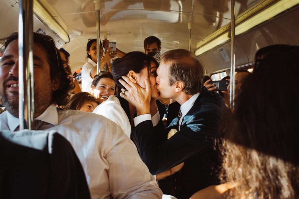 Dylan kisses Zina in red bus London